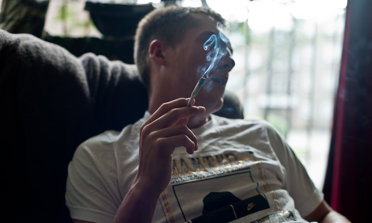 A teenager smoking